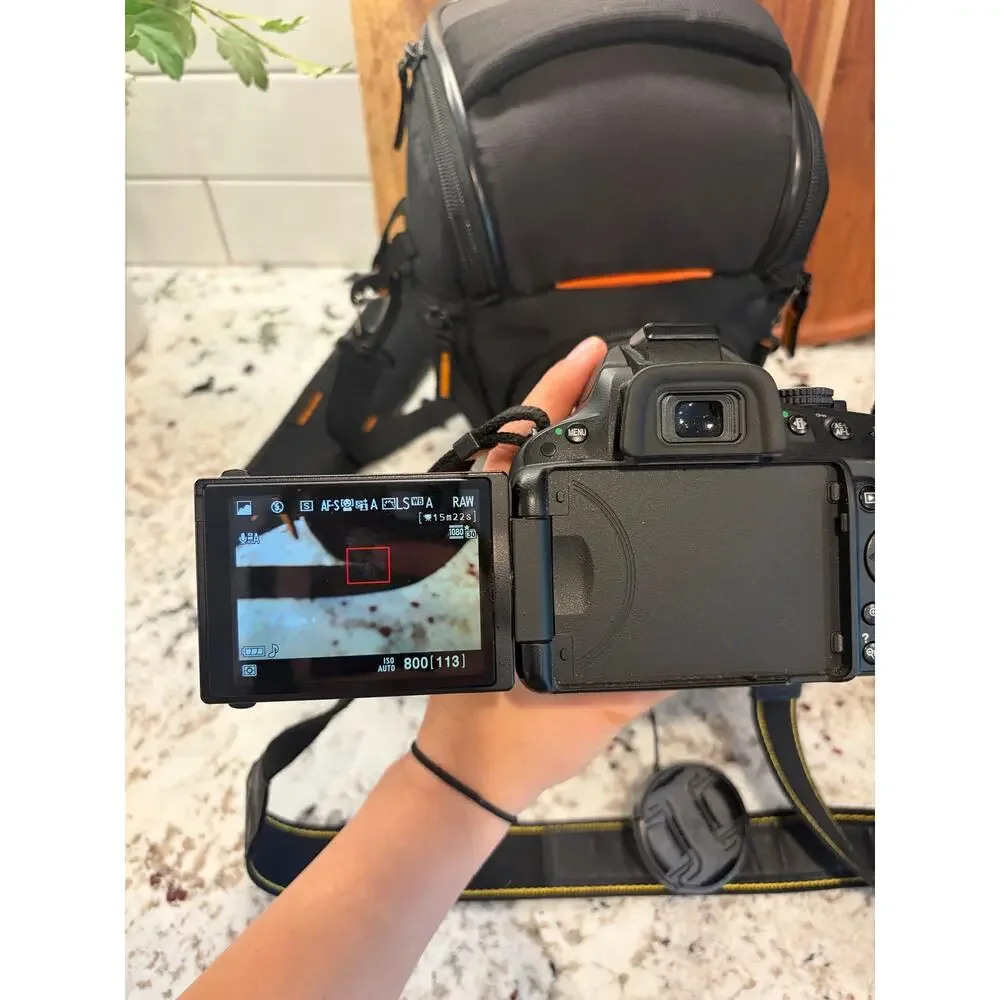 Nikon D5100 DSLR + 18-55mm VR Lens Kit, Case & Extra Batteries